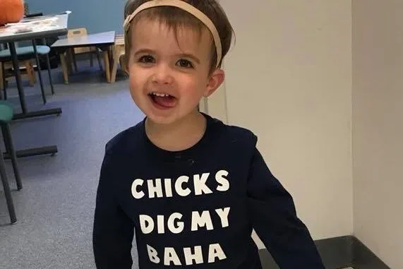 unilateral-hearing-loss Child wearing hearing device